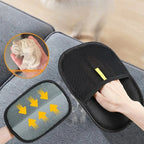 Handheld scrubber with mesh side and gray side, used on a surface.