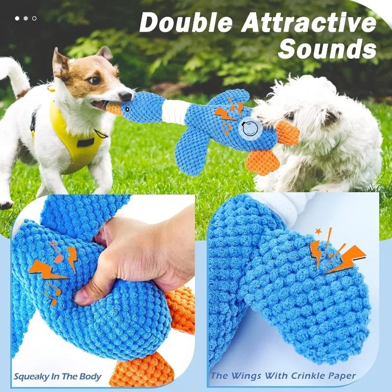 Dog toy with crinkle paper wings and squeaky sound, shown being played with by two dogs outdoors.